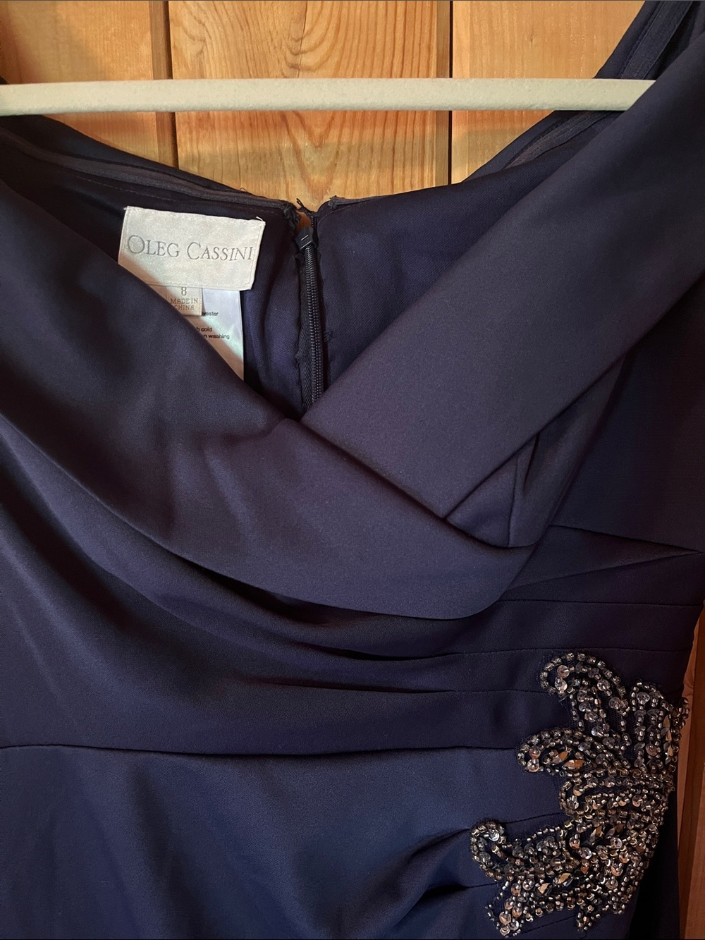 Oleg Cassini Navy Off-Shoulder gown with Beaded Applique - Picture 2 of 8